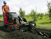 Toro Dingo with Trencher Attachment